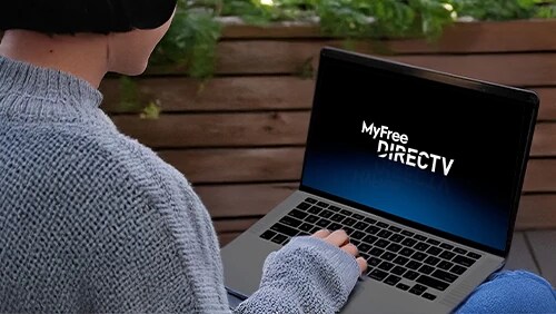 Person on PC showing MyFree DIRECTV.